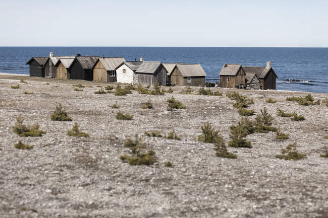 Beach Cabins At Sea Shore Copy Space Clear Sky Stock Photo