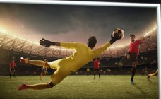 Football game moment with goalkeeper — Stock Photo