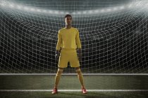 Goalkeeper standing in front of goal — Stock Photo