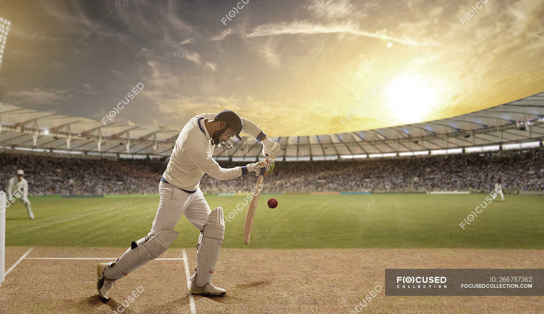 Side View Of Batsman Defending Ball During Match At Stadium Sports side-view-of-batsman-defending-ball-during-match-at-stadium-sports