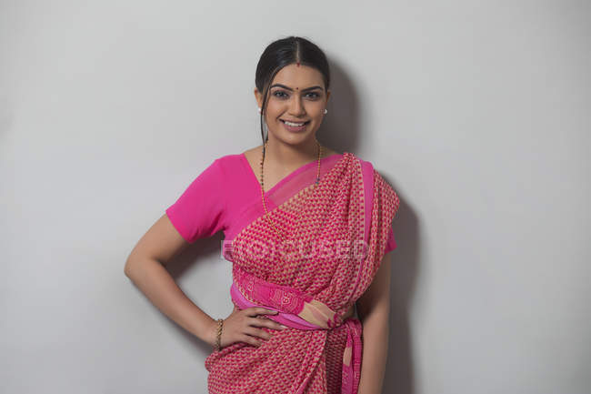 Young woman in saree smiling — Stock Photo