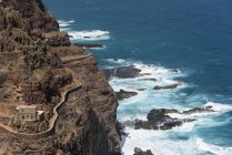 Cape Verde, Santo Antao, aerial view of road by rocky coast in sunshine — Stock Photo
