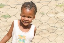 Намибия, Карас, Китманшуп, Смеющийся ребёнок из Намибии — стоковое фото