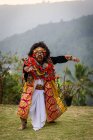 KABUL BULELENG, BALI, INDONESIA - JUNE 7, 2018 : Performance of local dance school, boy in costume and balian mask — Stock Photo