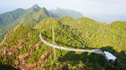 Malaysia, Kedah, Langkawi, Sky Bridge in Langkawi, scenic view of forest on mountains slopes in sunlight — Stock Photo