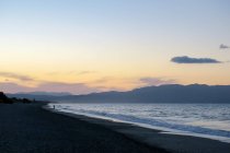 Греція, Крит, Ханья, захід сонця на пляжі в Ханьї — стокове фото