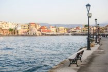 Greece, Crete, Chania, old town Chania on water at sunset — Stock Photo