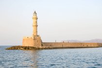 Grèce, Crète, La Canée, point de repère de Chanias, phare au coucher du soleil — Photo de stock