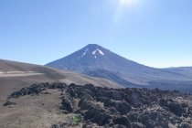 Chile, Malleco, Sunny landscape with volcano in Malalcahuello — Stock Photo