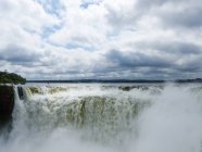 Scenic view on clouds above waterfall in Iguazu, Argentina — Stock Photo