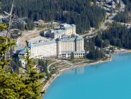 Canada, Alberta, Division No. 15, panoramic aerial view of hotel on Lake Louise — Stock Photo