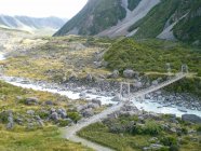 New Zealand, Canterbury, Mount Cook National Park, Mt Cook, view of bridge and river — Stock Photo