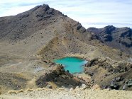 New Zealand, Manawatu-Wanganui, Tongariro National Park, Tongariro Alpine Crossing - view of sulfur lake — Stock Photo