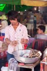 Cambodia, Kep, crabs market, man groomed skate parts for sale on the crabs market — Stock Photo