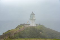 Neuseeland, Nordland, Kap Reinga, Leuchtturm am Kap Reinga bei Nebel — Stockfoto