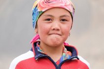 Portrait of girl with headscarf on head, Tajikistan — Stock Photo