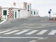 Spain, Canary Islands, Yaiza, road junction at Yaiza. — Stock Photo