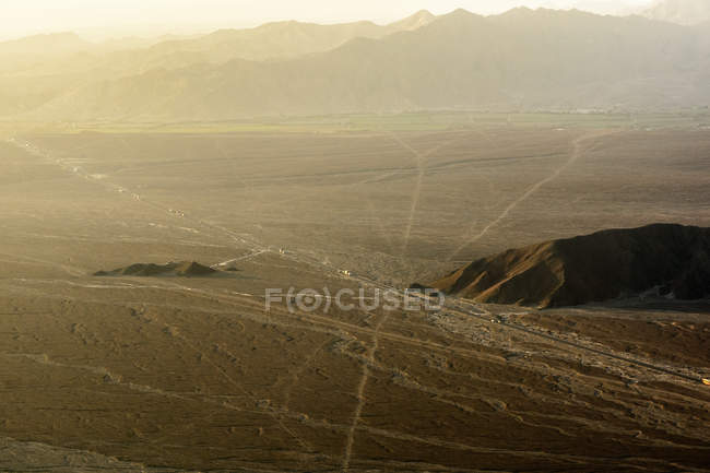 Peru, Ica, Nasca, sightseeing over the lines of Nazca mountains at sunset — Stock Photo