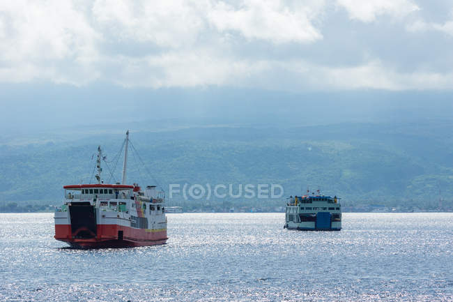 Indonesia, Java Timur, Two ferries on sea from Gilimanuk to Java — Stock Photo
