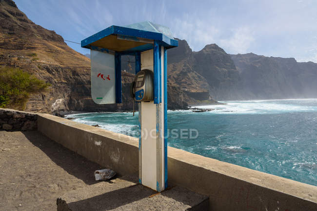 Cape Verde, Santo Antao, The island of Santo Antao is the peninsula of Cape Verde, telephone booth by rocky seashore — Stock Photo