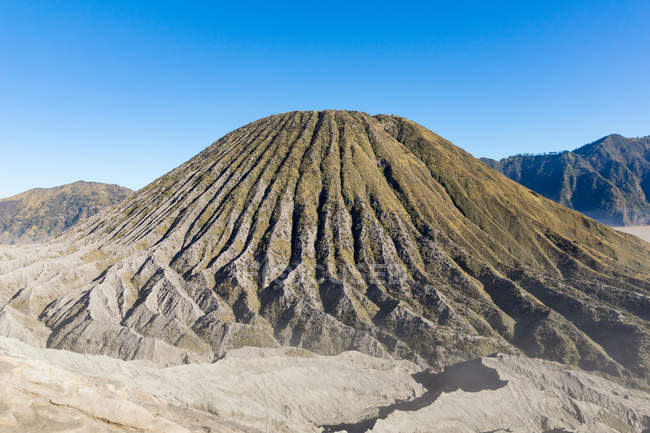 Indonesia, Java, Probolinggo, Volcano Batok and mountains on background — Stock Photo