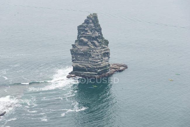 Ireland, County Clare, Cliffs of Moher boulders in the water from above — Stock Photo