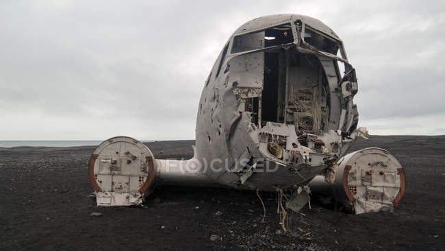 Solheimasandur aircraft wreck on black sand, Iceland — Stock Photo