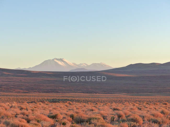 Chile, Region de Antofagasta, El Loa, San Pedro de Atacama, mountain panorama at sunset — Stock Photo
