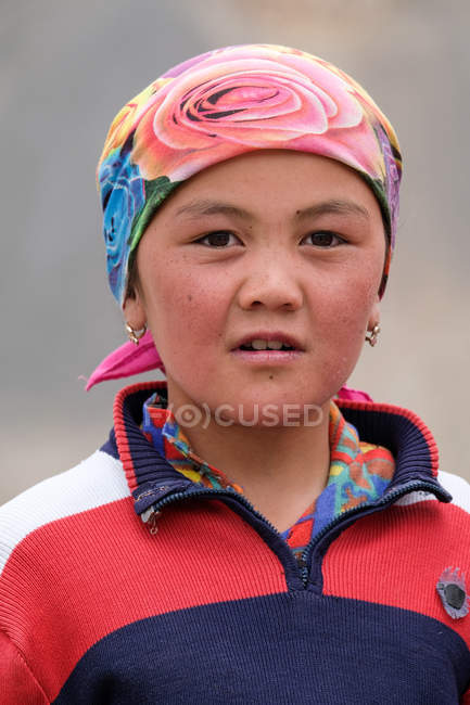 Portrait of girl with headscarf on head from Tajikistan — Stock Photo