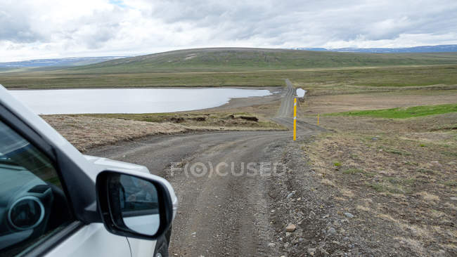 Iceland, Skutustadahreppur, car travel to the natural lake — Stock Photo