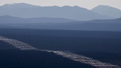 Aerial view over mountains silhouettes in South Cariboo region of British Columbia in Canada. — Stock Photo