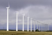 Row of  white wind turbines near Pincher Creek, Alberta, Canada — Stock Photo
