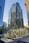 Sculptures monument of front of bank tower in Montreal, Quebec, Canada — Stock Photo