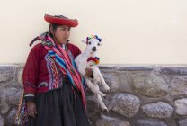 Local village teenage girl with lamb, Cuzco, Peru — Stock Photo
