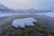 Partially ice covered Kathleen Lake in Kluane national Park, Yukon, Canada. — Stock Photo
