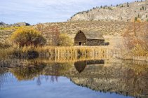 Reflection of old barn located between Osoyoos and Oliver, Okanagan Valley of British Columbia, Canada. — Stock Photo