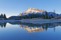 Mount Rundle reflecting in Cascade Pond, Banff National Park, Alberta, Canada. — Stock Photo