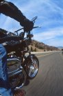 Motorcycle rider, point of view, blurred road, British Columbia, Canada. — Stock Photo