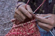 Close-up of local man knitting, Cuzco, Peru — Stock Photo