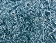 Ice crystals pattern detail on water surface, full frame — Stock Photo