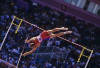 Pole vaulter attempting to clear bar, British Columbia, Canada. — Stock Photo