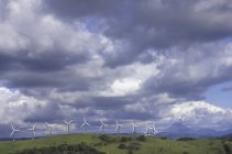 Wind turbines in hills above Lake Arenal of Guancaste Province in Costa Rica — Stock Photo