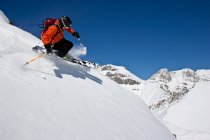 Young man skiing powder at Lake Louise Ski Area, Banff National Park, Alberta, Canada. — Stock Photo