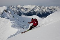 Young man skiing powder at Lake Louise Ski Area, Banff National Park, Alberta, Canada. — Stock Photo