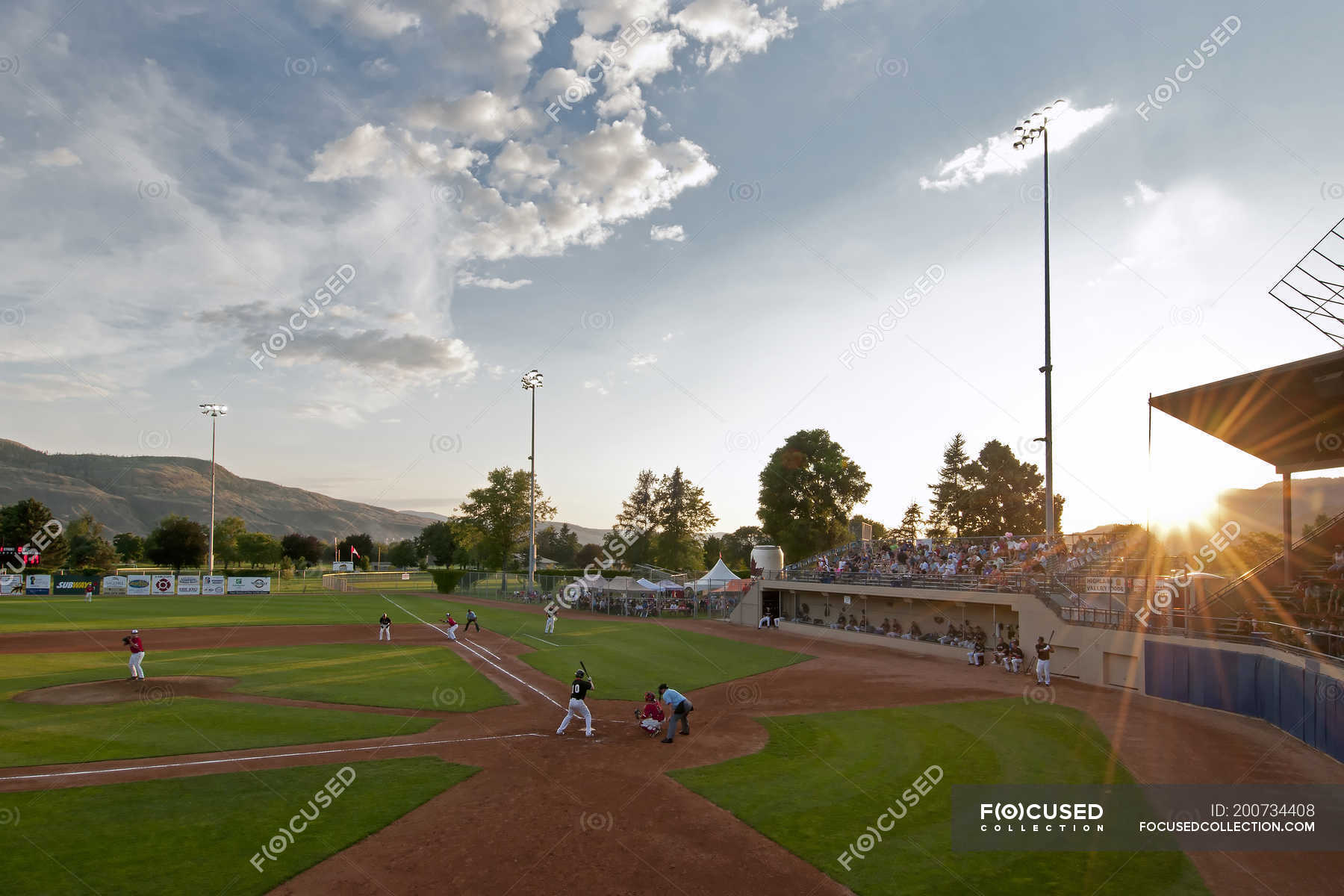 Baseball game being played at dusk in Kamloops, Thompson Okanagan