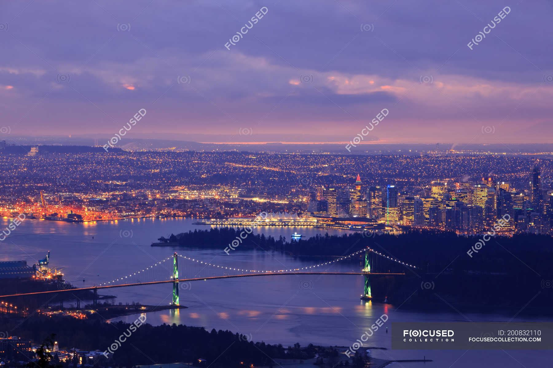 Vancouver skyline with Lion Gate Bridge and Burrard Inlet at dawn ...