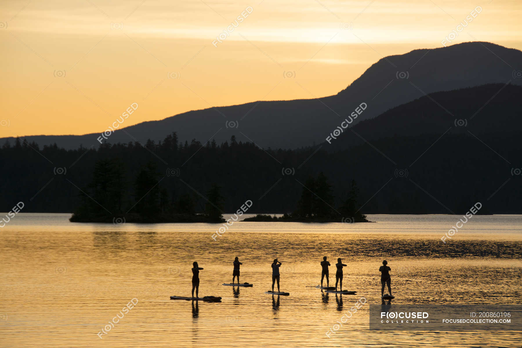 Stand up paddleboard group on Ruby Lake, Sunshine Coast, British