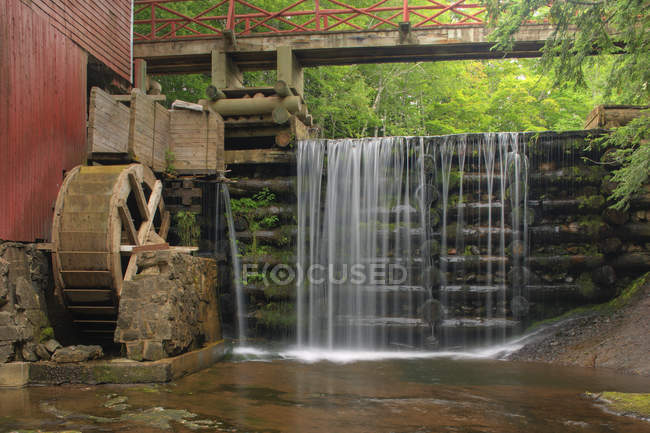 Flowing water of old Balmoral Grist Mill in Balmoral Mills, Nova Scotia, Canada. — Stock Photo