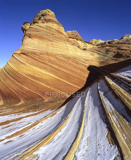 Slickrock covered with snow in Coyote Buttes, Utah — Stock Photo