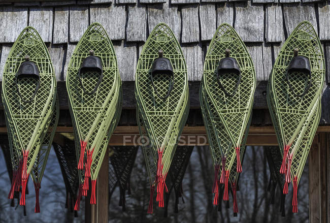 Snowshoes hanging on wall, Fort Whyte, Manitoba, Canada — Stock Photo